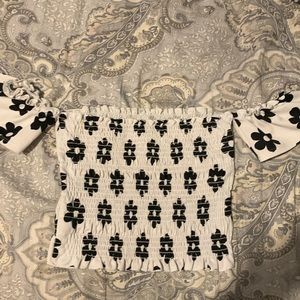 Off the shoulder floral tube top.